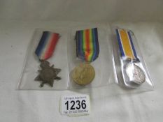 A WW1 Victory medal, war medal and 1914 star for Pte. J Hammond, C Gds.