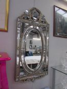 A decorative Italian style mirror,.