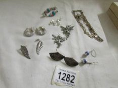 7 pairs of vintage ear pendants including some silver,