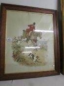 A framed and glazed hunting scene marked Hark Hallou and initialled.