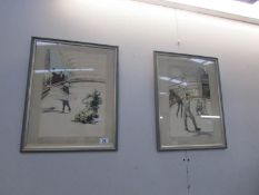 A pair of framed and glazed circus prints.