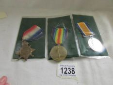 A WW1 Victory medal, British war medal and 1914/15 star for Sgt. H.G.Hopkins, R.F.A.