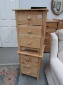 A pair of pine 3 drawer bedside chests