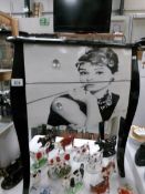 A 2 drawer chest depicting Audrey Hepburn.