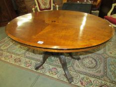 A Victorian oval inlaid loo table.