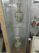 A pair of early Chinese vases,