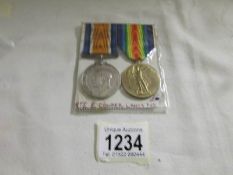 A British war and victory medals for Pte. E. Cooper, Lancashire Fusiliers.