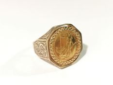 A 1989 £10 Britannia gold coin set in 9ct gold ring, size O.