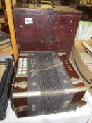 A Vulkan accordian, made in Germany, Genuine steel reeds complete with wooden box.