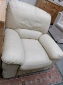 A cream leather chair,
