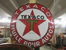 A French circular Texaco enamel sign.