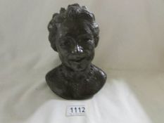 A heavy bust of Queen Elizabeth the Queen Mother.