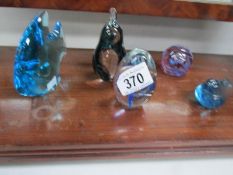 5 glass paperweights including fish and bird.