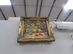 A gilt framed still life