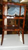 A 3 tier mahogany stand.