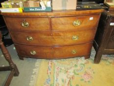 A Victorian 2 over 2 bow front chest of drawers.