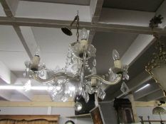 A vintage glass 5 arm chandelier.