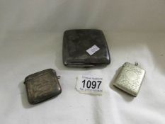 A silver Vesta case, Chester 1917/18, A silver cigarette case,