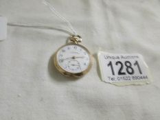 A vintage ladies 14ct gold fob watch, in working order,