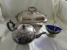 A silver plate tureen, teapot and sugar basket.