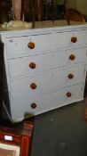 A painted 2 over 3 chest of drawers.