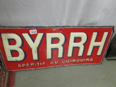 A Byrrh advertising sign.