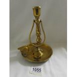 A 19th century brass ships gimble candle holder.