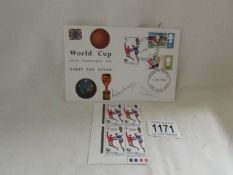 A world Cup first day cover signed by Bobby Moore.