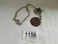 A WW1 dog tag (name indistinct) Leicester Regiment,