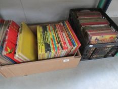 A collection of vintage children's books, annuals and comics.