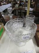 A cut glass footed bowl, vase and decanter.