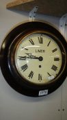 A Fusee wall clock marked LNER (London & North Eastern Railway) on clock face,