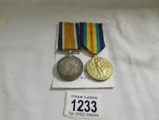 A British war and Victory medals for H Nichol, R.N.