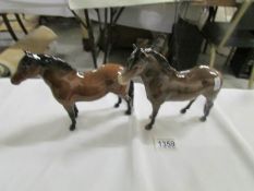 A Beswick Exmoor pony and a Beswick Dartmoor pony.