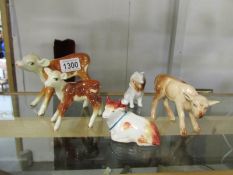 2 Beswick calves, A Sylvac lamb, an old Staffordshire cow and a collie dog.