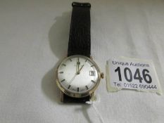 A 1970's Tissot Gentleman's gold wrist watch inscribed to rear 'D.W.Lee, Kelly's Directories Ltd.