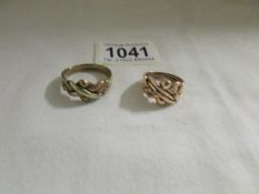 2 gold puzzle rings (1 HM 9ct) approximately 15 grams.