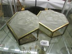 A pair of Lalique style wall lights.