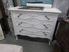 A white painted 3 drawer French style chest