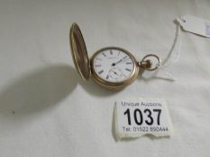 A Waltham full hunter pocket watch in working order (missing glass)