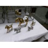 A large brass horse, 2 others and 2 white metal animal figures,.