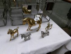 A large brass horse, 2 others and 2 white metal animal figures,.