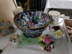 An oriental bowl, 2 commemorative mugs, porcelain music box,