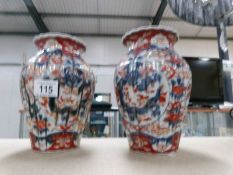 A pair of squat Imari vases, a/f.