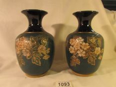 A pair of Lovatt Langley ware vases.
