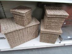 A set of 3 seagrass boxes and one other