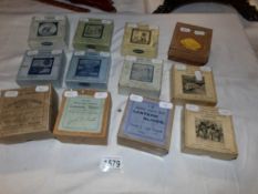 12 boxed sets of magic lantern slides being Sweep & White Washer, A frog he would a wooing go,