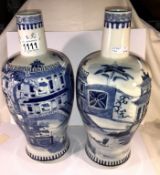 A large pair of rare shaped 19th century blue and white vases depicting large house,