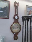 A Victorian mahogany barometer.