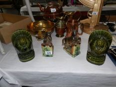 A pair of ceramic jumping horse bookends and a pair of bird bookends.